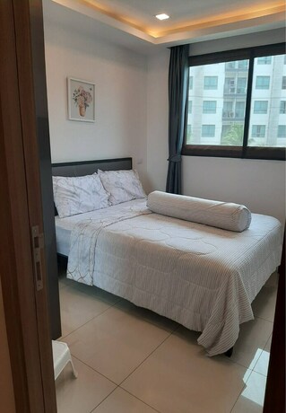 Imagen de la habitación del Hotel Arcadia Beach Condo By Jiabo. Foto 30