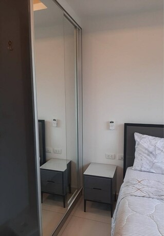 Imagen de la habitación del Hotel Arcadia Beach Condo By Jiabo. Foto 32
