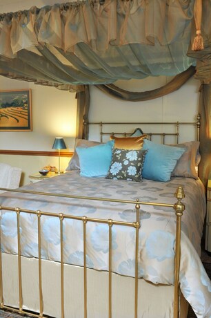 Imagen de la habitación del Hotel Arcadia Cottages. Foto 5