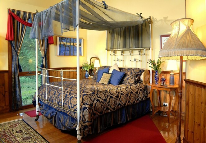 Imagen de la habitación del Hotel Arcadia Cottages. Foto 16