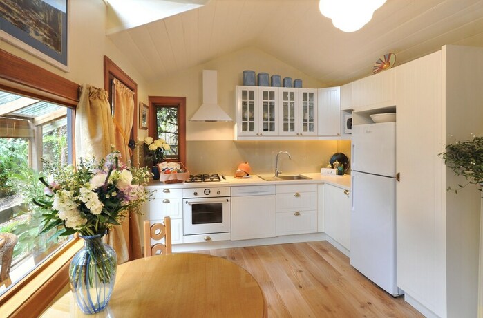 Imagen de la habitación del Hotel Arcadia Cottages. Foto 19