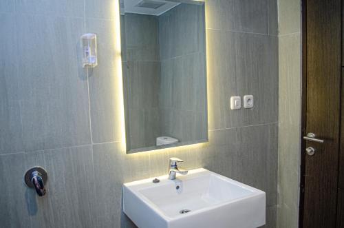 Imagen de la habitación del Hotel Arcadia Manado. Foto 18