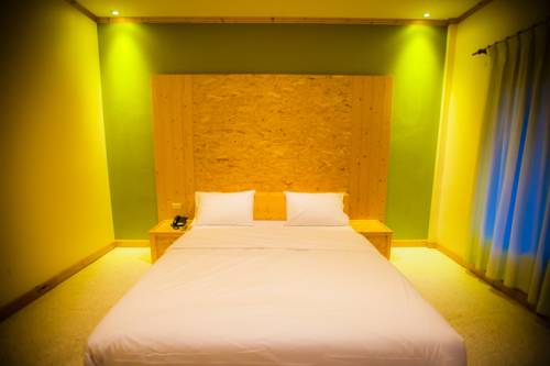 Imagen de la habitación del Hotel Arcadia Resort. Foto 3