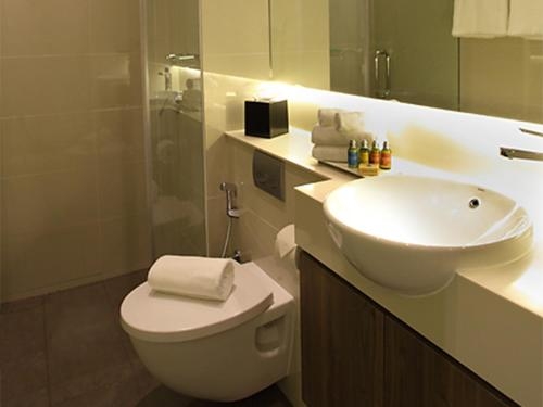 Imagen de la habitación del Hotel Arcadia, Singapur. Foto 8