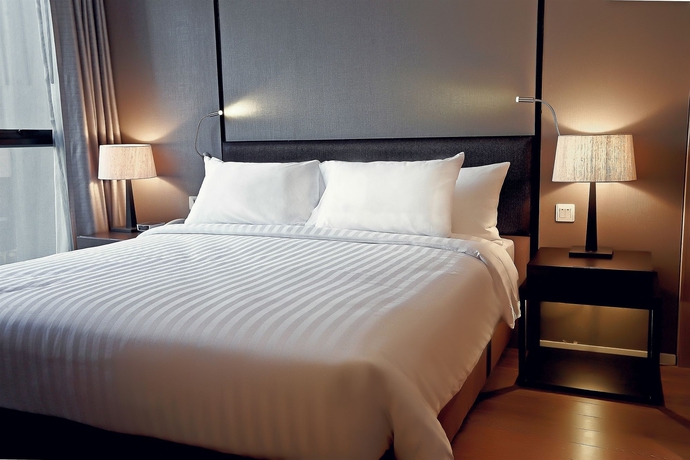 Imagen de la habitación del Hotel Arcadia Suites Bangkok. Foto 9