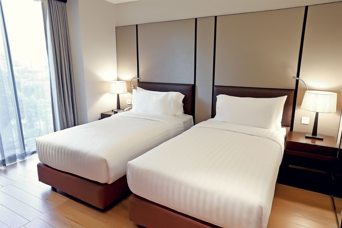 Imagen de la habitación del Hotel Arcadia Suites Bangkok. Foto 10