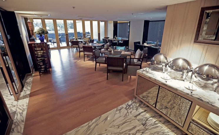 Imagen del bar/restaurante del Hotel Arcadia Suites Bangkok. Foto 4
