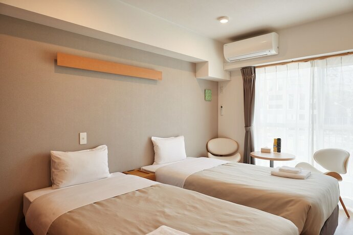 Imagen de la habitación del Hotel Arce Ryukyu Harbor Stay. Foto 16