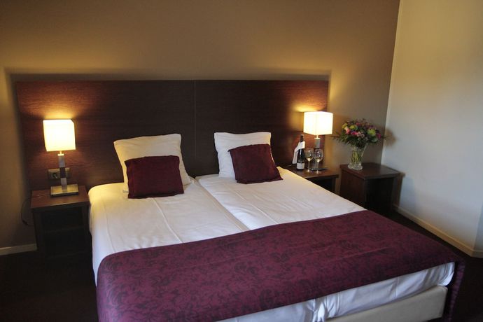 Imagen de la habitación del Hotel Arcen. Foto 7