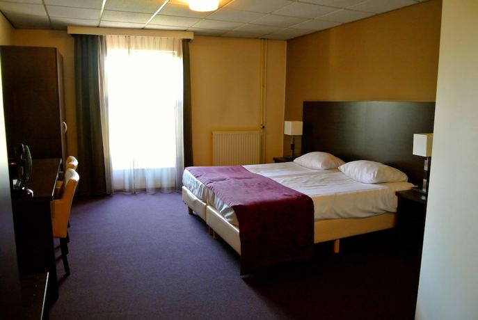 Imagen de la habitación del Hotel Arcen. Foto 14