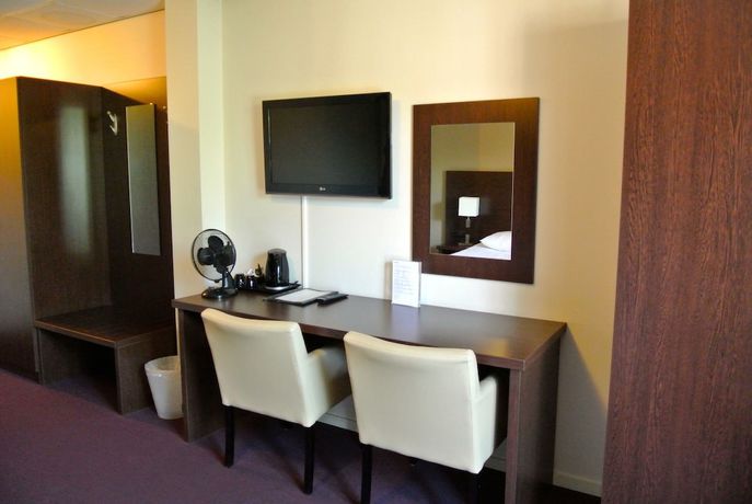 Imagen de la habitación del Hotel Arcen. Foto 15
