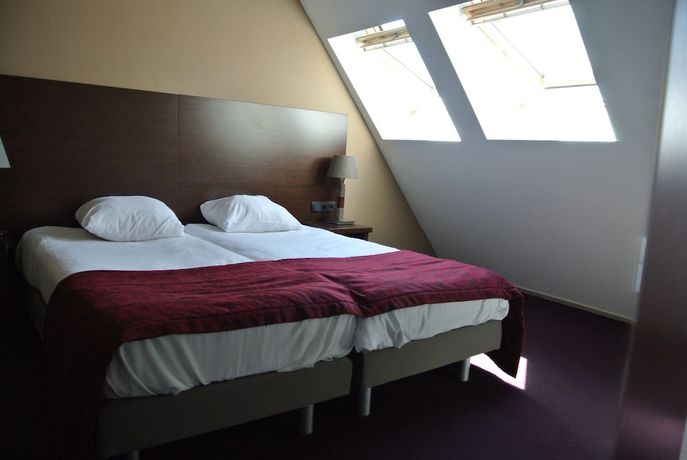 Imagen de la habitación del Hotel Arcen. Foto 19
