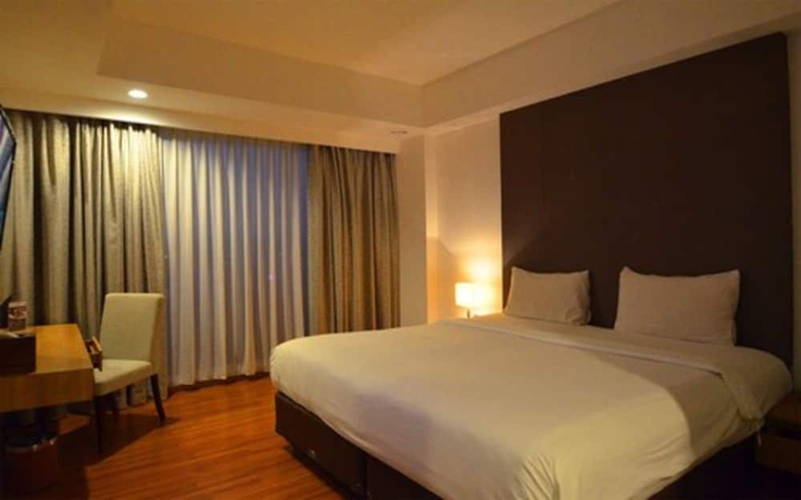 Imagen de la habitación del Hotel Arch, Bogor. Foto 8