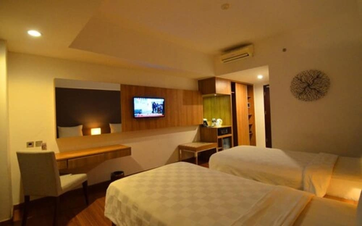 Imagen de la habitación del Hotel Arch, Bogor. Foto 10