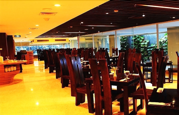 Imagen del bar/restaurante del Hotel Arch, Bogor. Foto 3