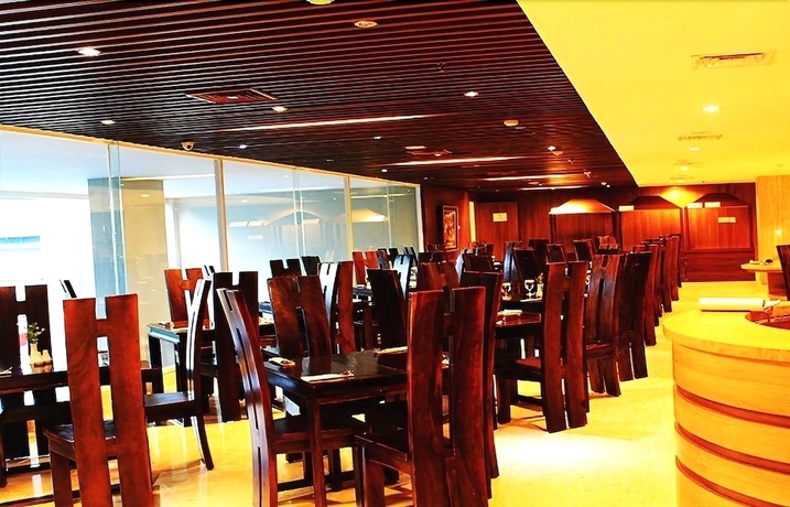 Imagen del bar/restaurante del Hotel Arch, Bogor. Foto 4
