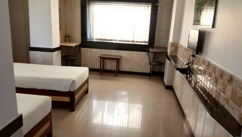 Imagen de la habitación del Hotel Arch Manor Deluxe. Foto 11
