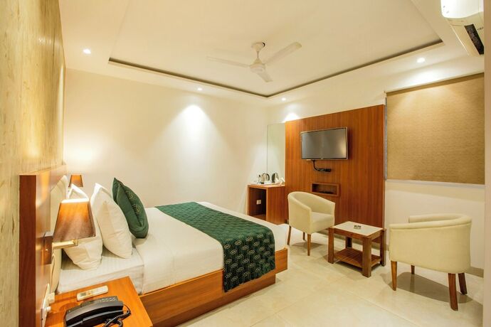 Imagen de la habitación del Hotel Arch Suites. Foto 19