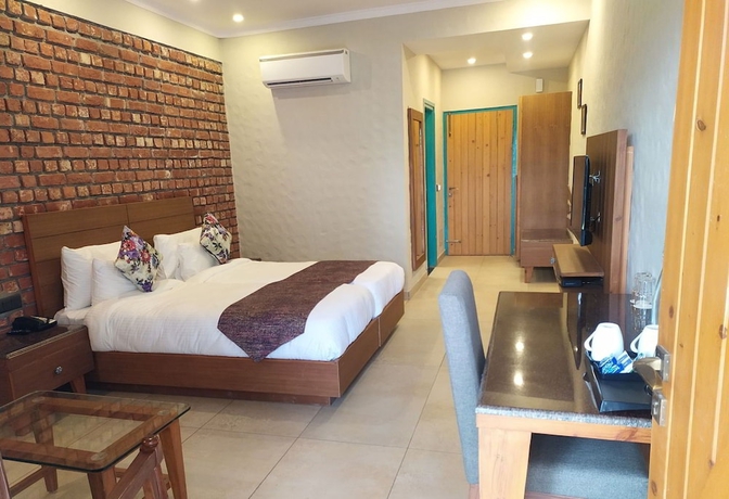 Imagen de la habitación del Hotel Arch The Baakhli Resort. Foto 11