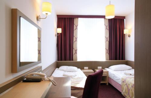 Imagen de la habitación del Hotel Arche Siedlce. Foto 7