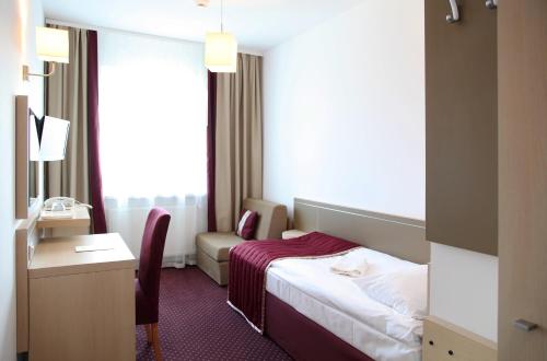 Imagen de la habitación del Hotel Arche Siedlce. Foto 8