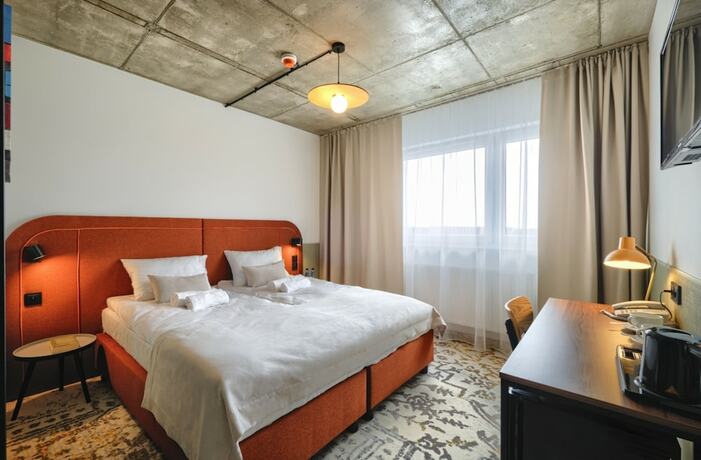 Imagen de la habitación del Hotel Arche Wrocław Airport. Foto 16