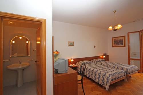 Imagen de la habitación del Hotel Archimede. Foto 2