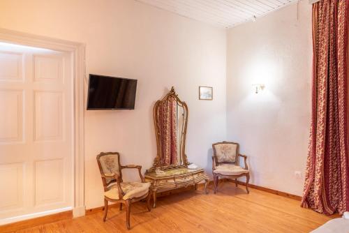 Imagen de la habitación del Hotel Archontiko Petrettini Boutique. Foto 12