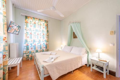 Imagen de la habitación del Hotel Archontiko Petrettini Boutique. Foto 15
