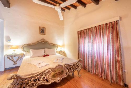Imagen de la habitación del Hotel Archontiko Petrettini Boutique. Foto 16