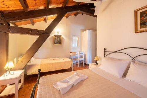 Imagen de la habitación del Hotel Archontiko Petrettini Boutique. Foto 17