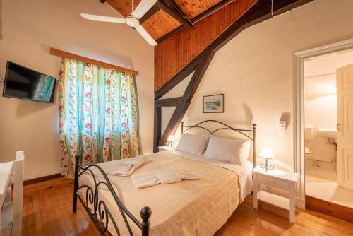 Imagen de la habitación del Hotel Archontiko Petrettini Boutique. Foto 18