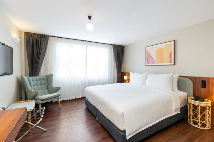 Imagen de la habitación del Hotel Arck, Bangkok. Foto 7