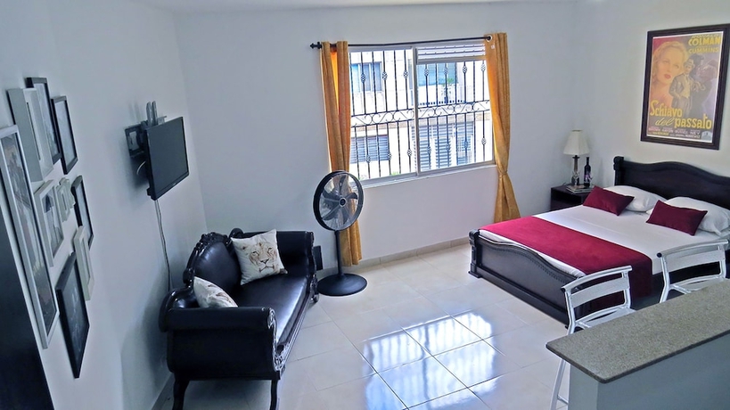 Imagen de la habitación del Hotel Arco Apartasuites. Foto 11