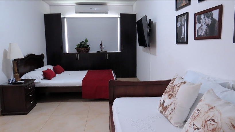 Imagen de la habitación del Hotel Arco Apartasuites. Foto 12