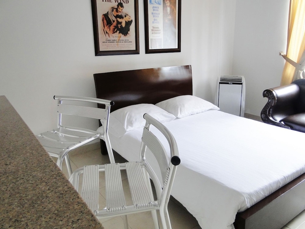 Imagen de la habitación del Hotel Arco Apartasuites. Foto 17