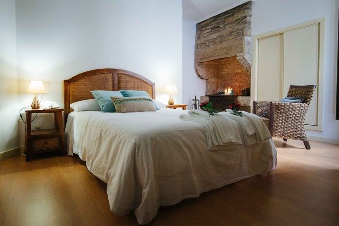 Imagen de la habitación del Hotel Arco De Mazarelos. Foto 8