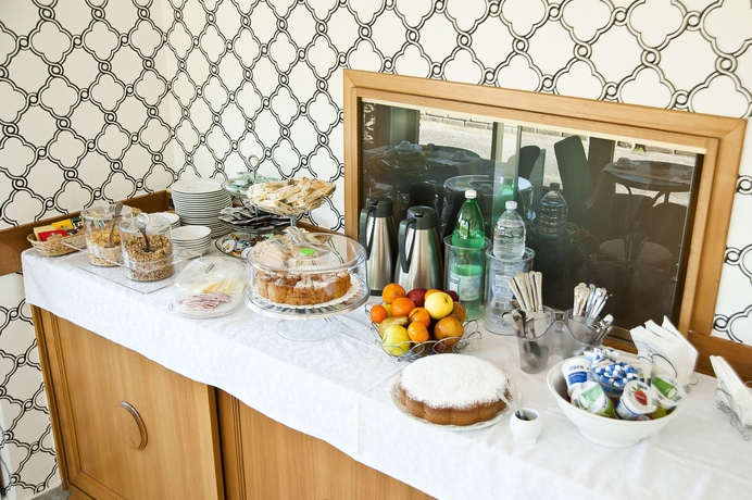 Imagen del bar/restaurante del Hotel Arco Di Travertino. Foto 3