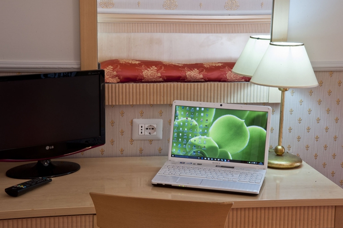 Imagen de la habitación del Hotel Arco Di Travertino. Foto 7