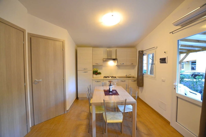 Imagen de la habitación del Hotel Arcobaleno Camping. Foto 7