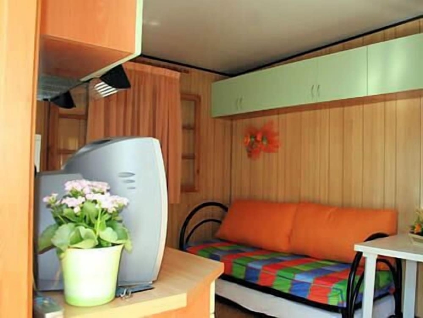 Imagen de la habitación del Hotel Arcobaleno Camping. Foto 8