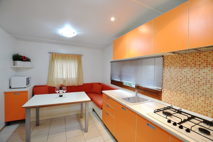 Imagen de la habitación del Hotel Arcobaleno Camping. Foto 9