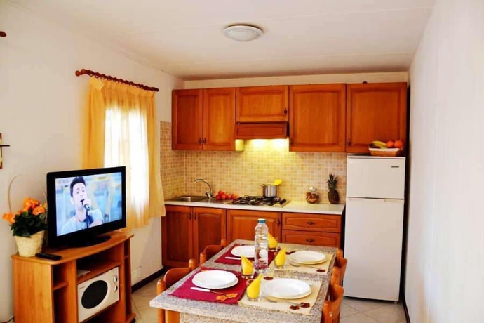 Imagen de la habitación del Hotel Arcobaleno Camping. Foto 10