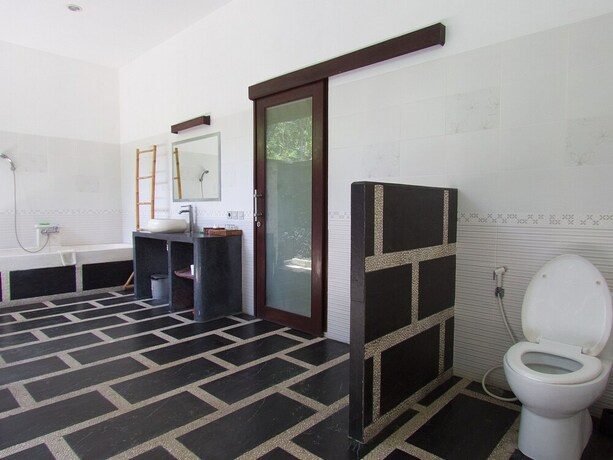 Imagen de la habitación del Hotel Arcoiris, Bali. Foto 30