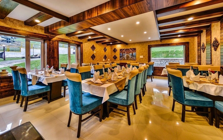 Imagen del bar/restaurante del Hotel Arcos and Resorts Sonamarg. Foto 7