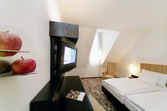 Imagen de la habitación del Hotel Arcotel Camino. Foto 12