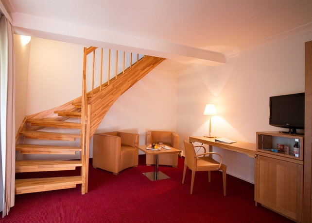 Imagen de la habitación del Hotel Arcotel Castellani Salzburg. Foto 6