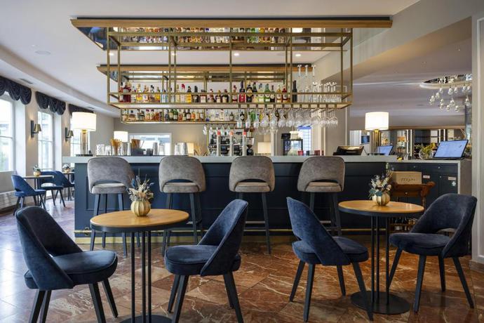 Imagen del bar/restaurante del Hotel Arcotel Castellani Salzburg. Foto 4