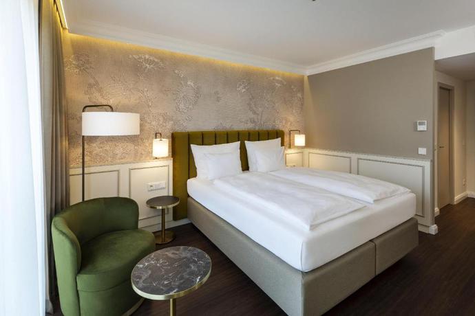 Imagen de la habitación del Hotel Arcotel Castellani Salzburg. Foto 11