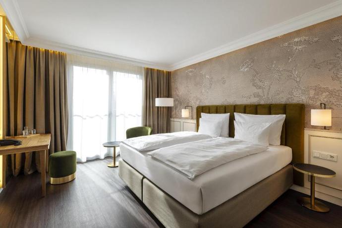 Imagen de la habitación del Hotel Arcotel Castellani Salzburg. Foto 12